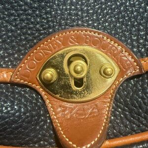 Dooney & Bourke Black and Tan Leather Bag with Gold Accent